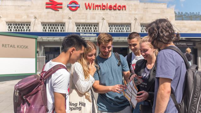 Students outside Wimbledon Station