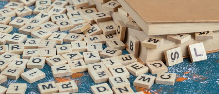 Book with Wooden Letters Spilling Out